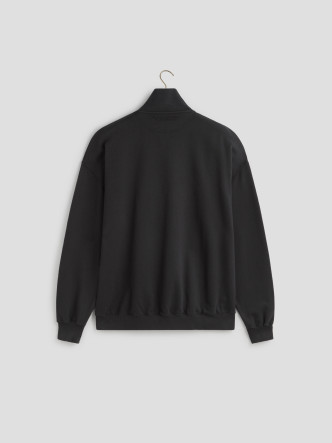 La LOGO QUARTER ZIP en un intenso color Caviar de Les Héritiers